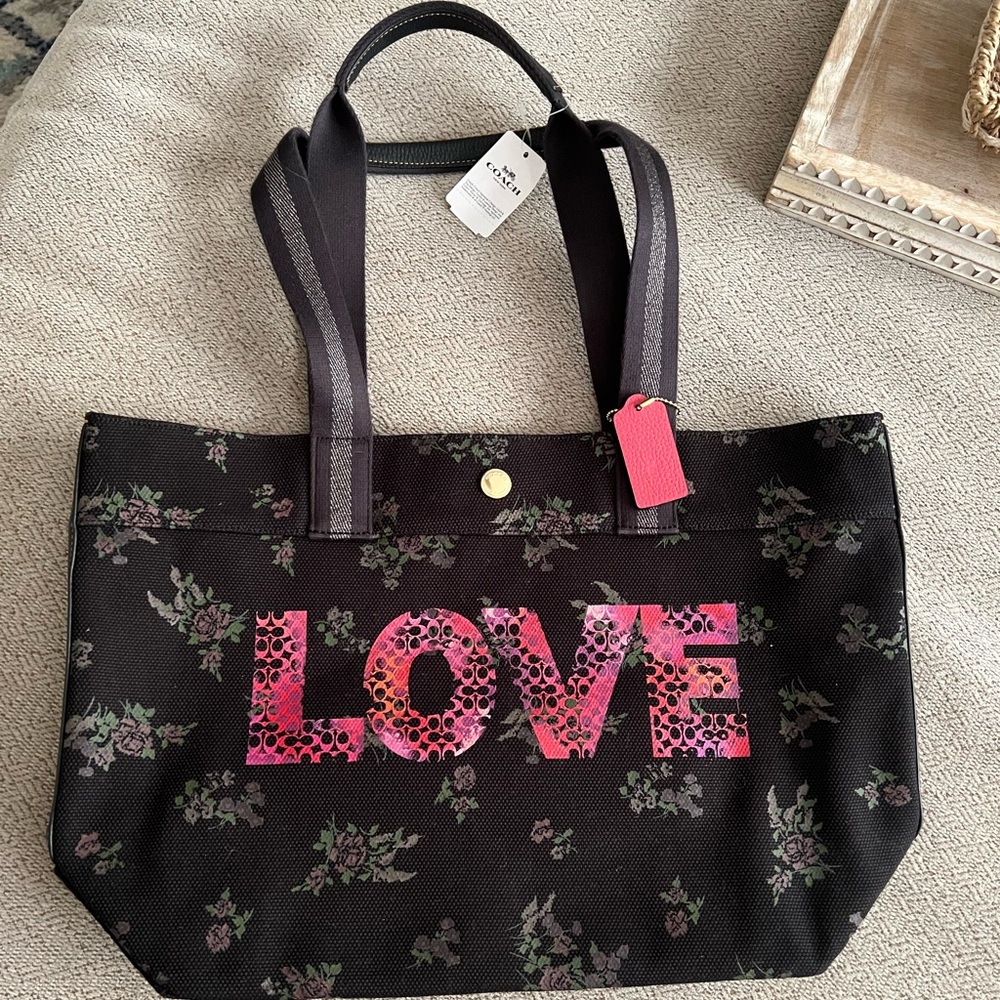 Coach “Love” collection black floral tote shoulder bag